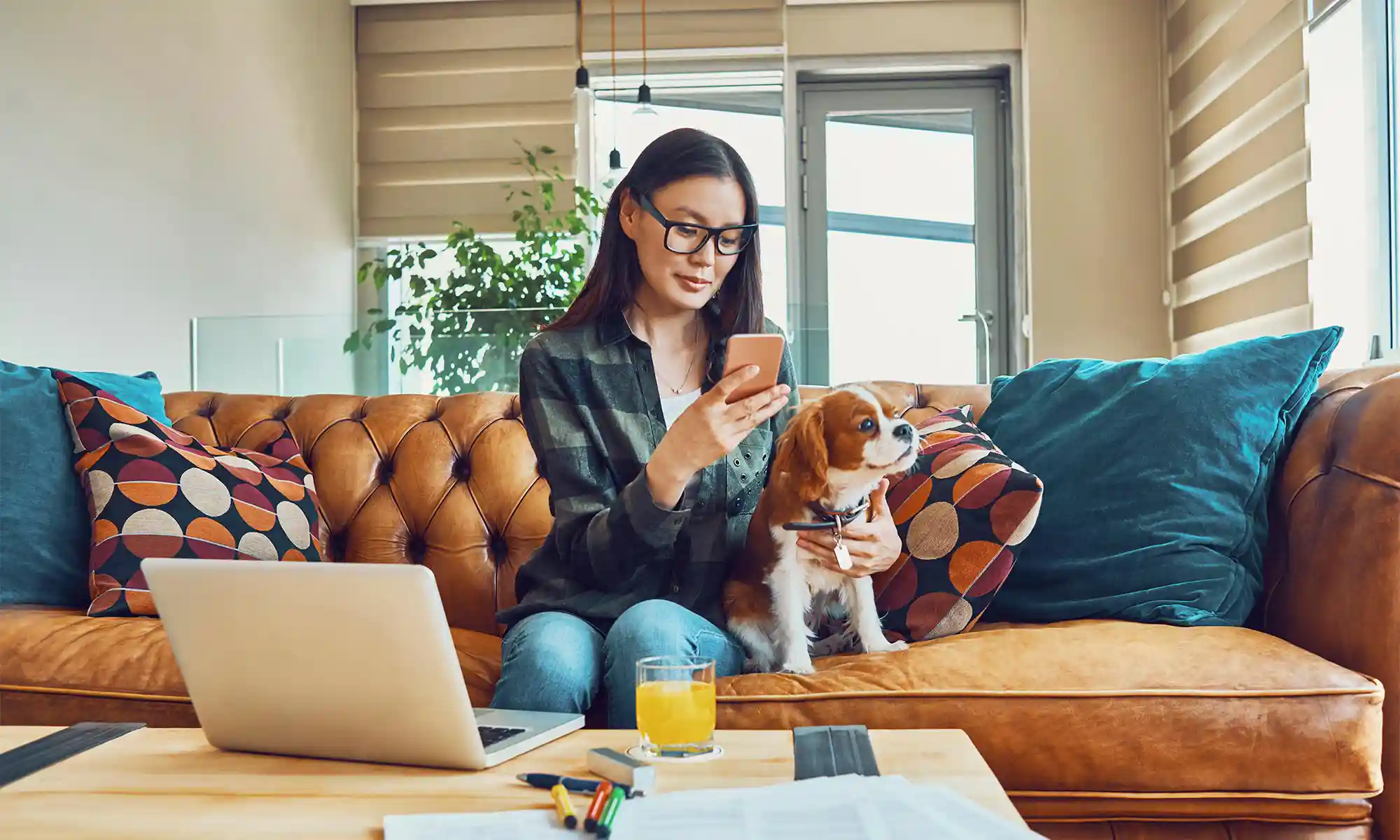 A woman filling out a form with her cat